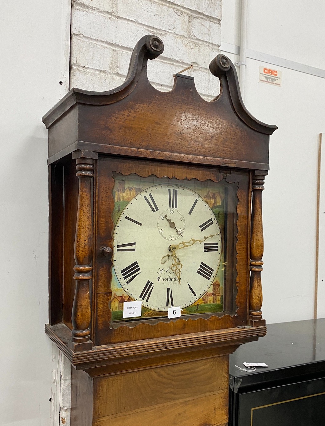 An early 19th century mahogany thirty hour longcase clock, the painted dial marked R. Grant, East Hoathly, height 216cm